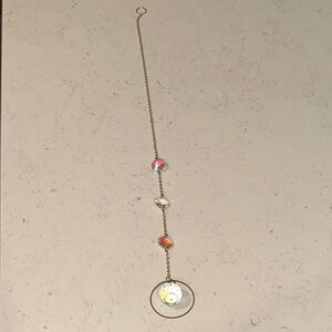 Elegant rose-gold chain and clear/warm color prism ; sun catcher, 16 inches long